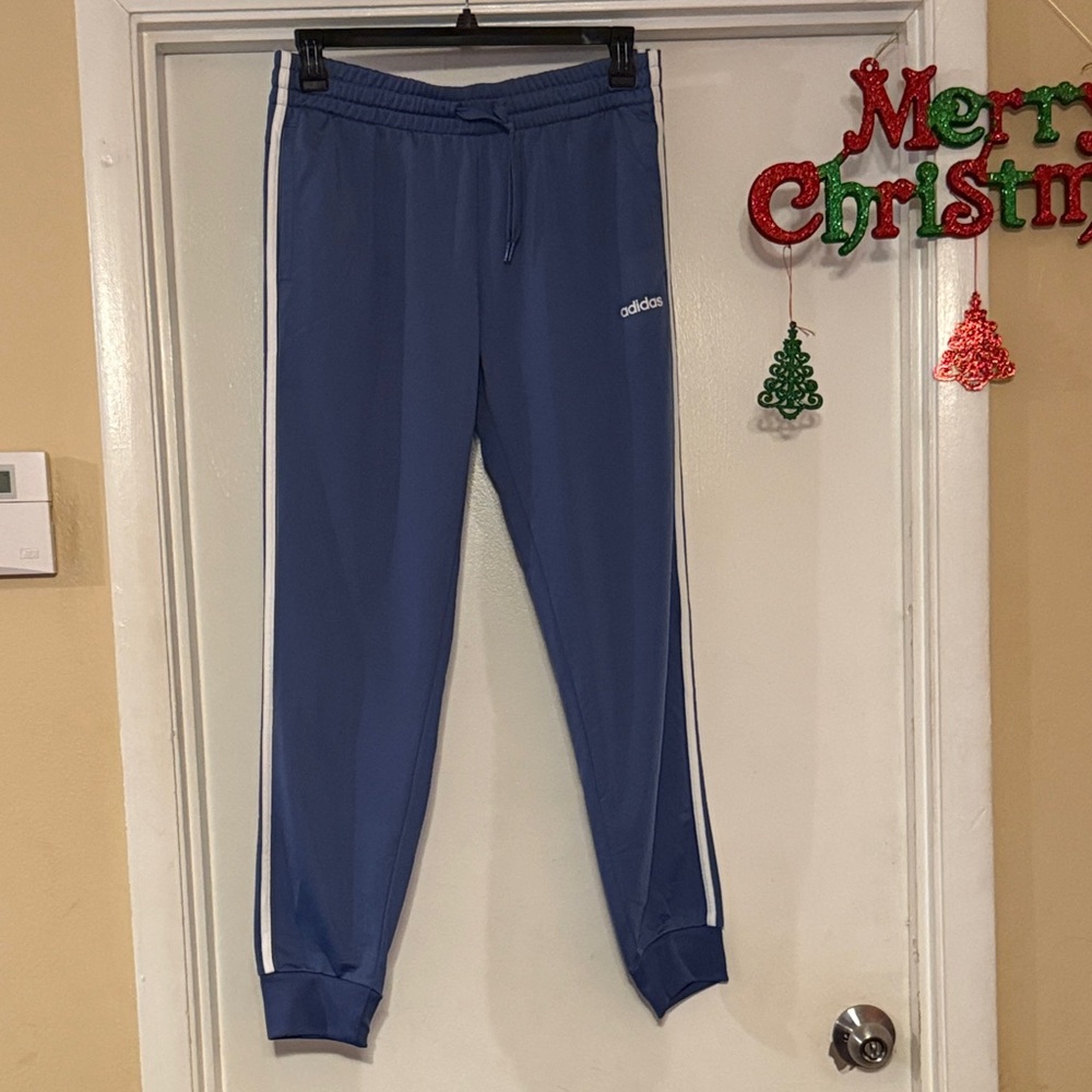 Adidas Women's Blue Joggers with White Stripes